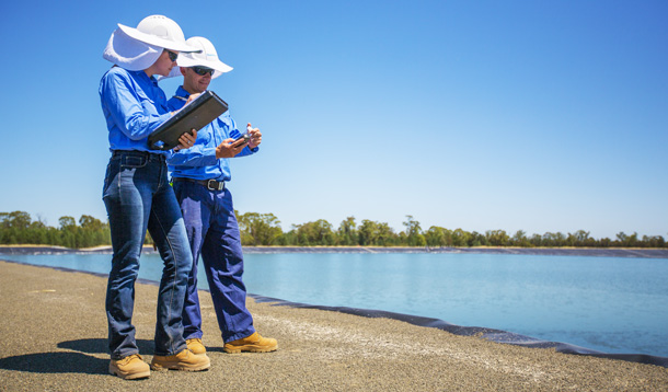 Shane Rily and Megan Martin conducting some routine water testing at Santos’ state of the art water holding ponds at Leewood