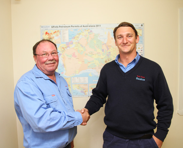 Kym Bailey handing the reins over to Superintendent Narrabri Operations Todd Dunn (pic courtesy of the Narrabri Courier)